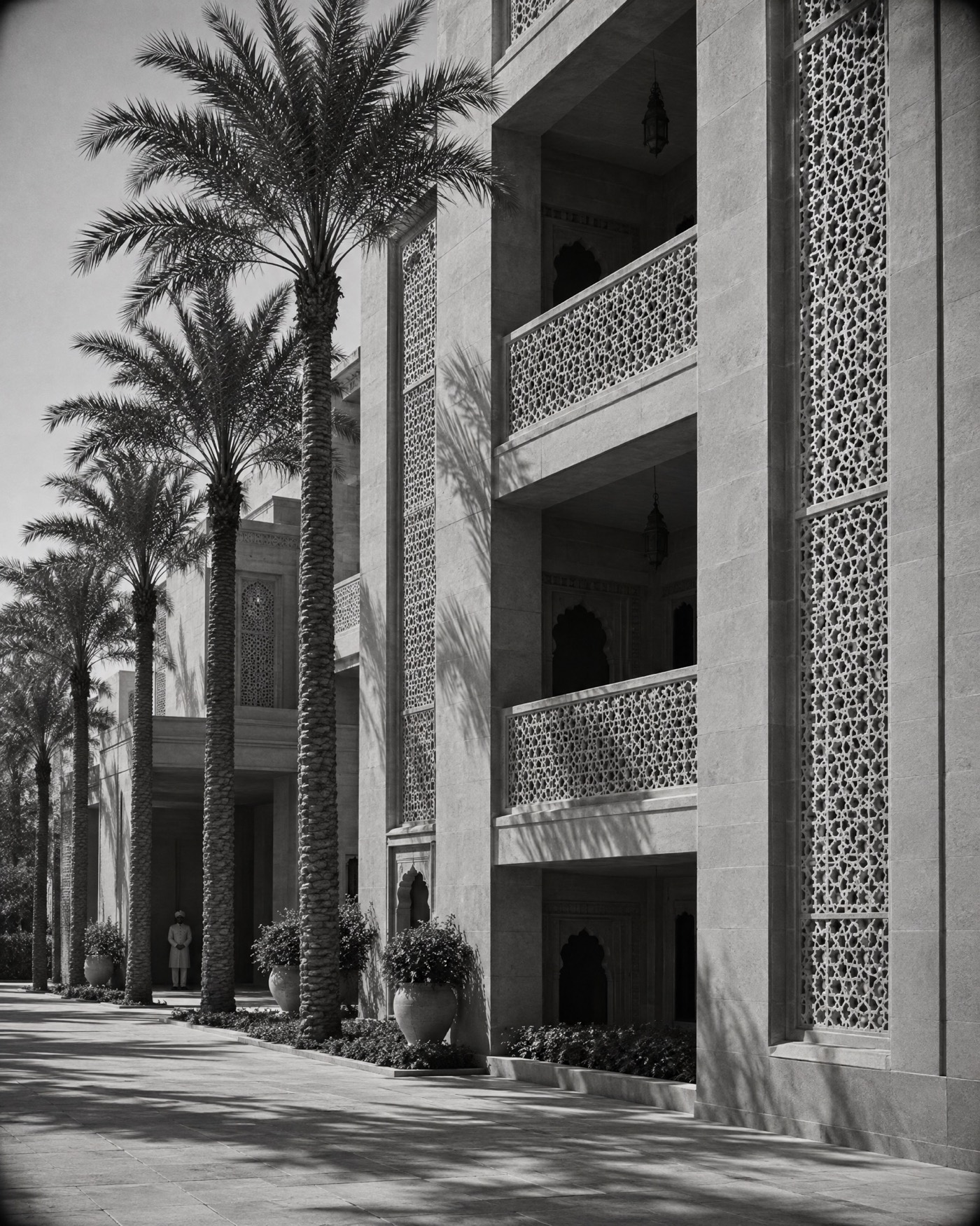 Boutique hotel facade with carved screens